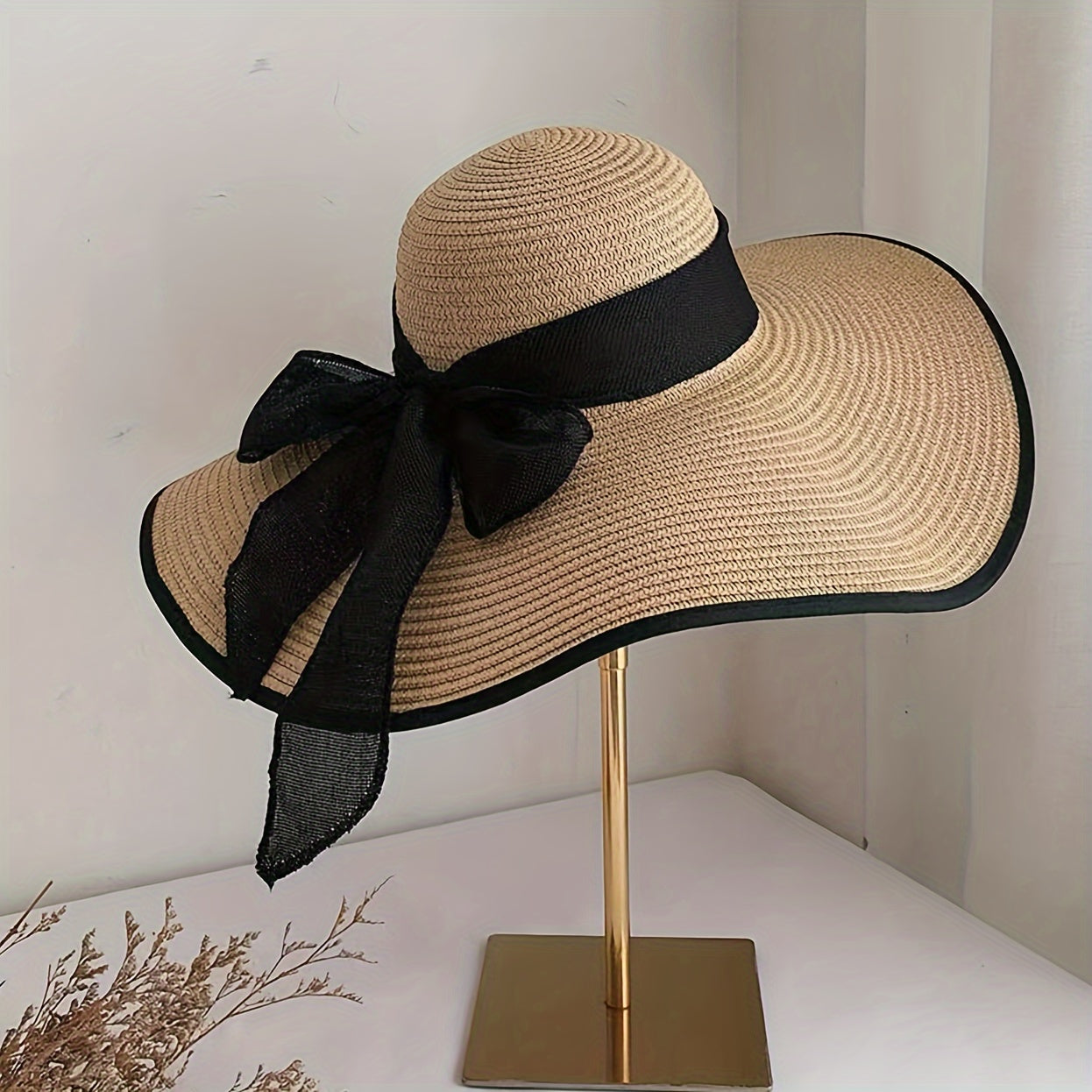 Elegant Women's Straw Sun Hat with Black Ribbon Bow