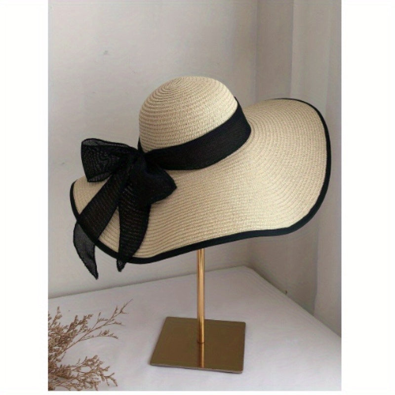 Elegant Women's Straw Sun Hat with Black Ribbon Bow